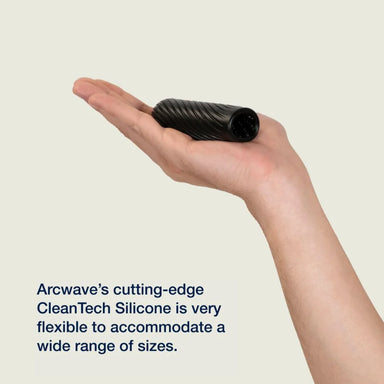 A hand holding arcwave ghost, with the words "Arcwave's cutting-edge CleanTech Silicone is very flexible to accommodate a wide range of sizes.