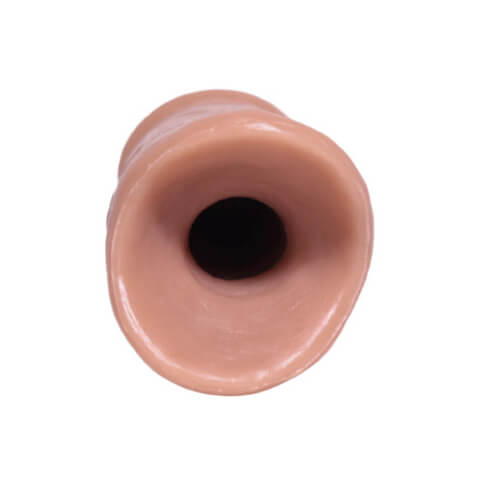 The bottom view of the stroker, showing the entrance hole. Colour option 001, the lightest skin tone. 