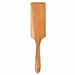 Wooden paddle on a white background 