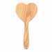 Wooden heart-shaped paddle on a white background
