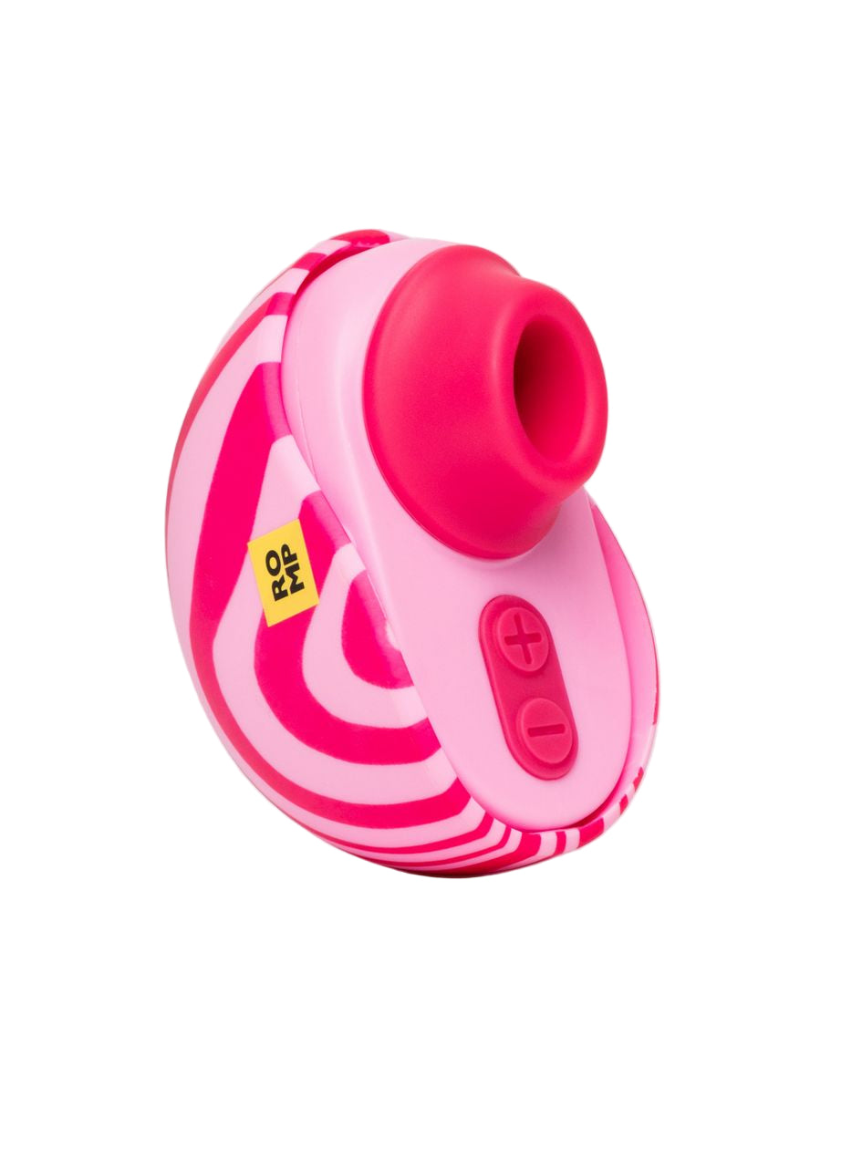 Pink and white striped toy, with its cap open