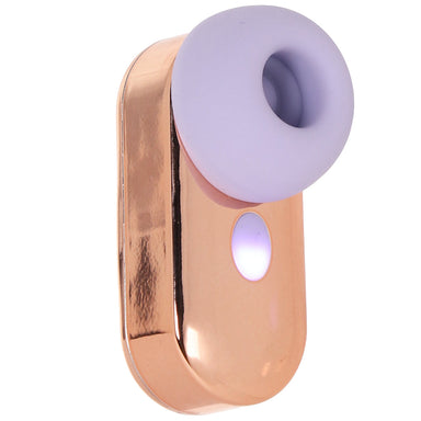 Air pulse clitoral toy with rose gold casing and purple silicone cover on a white background