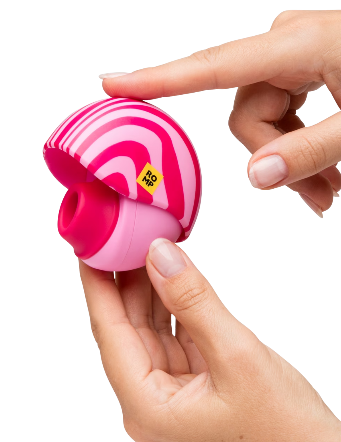 The ROMP Spin being held up to show the case closing around the front of the toy.