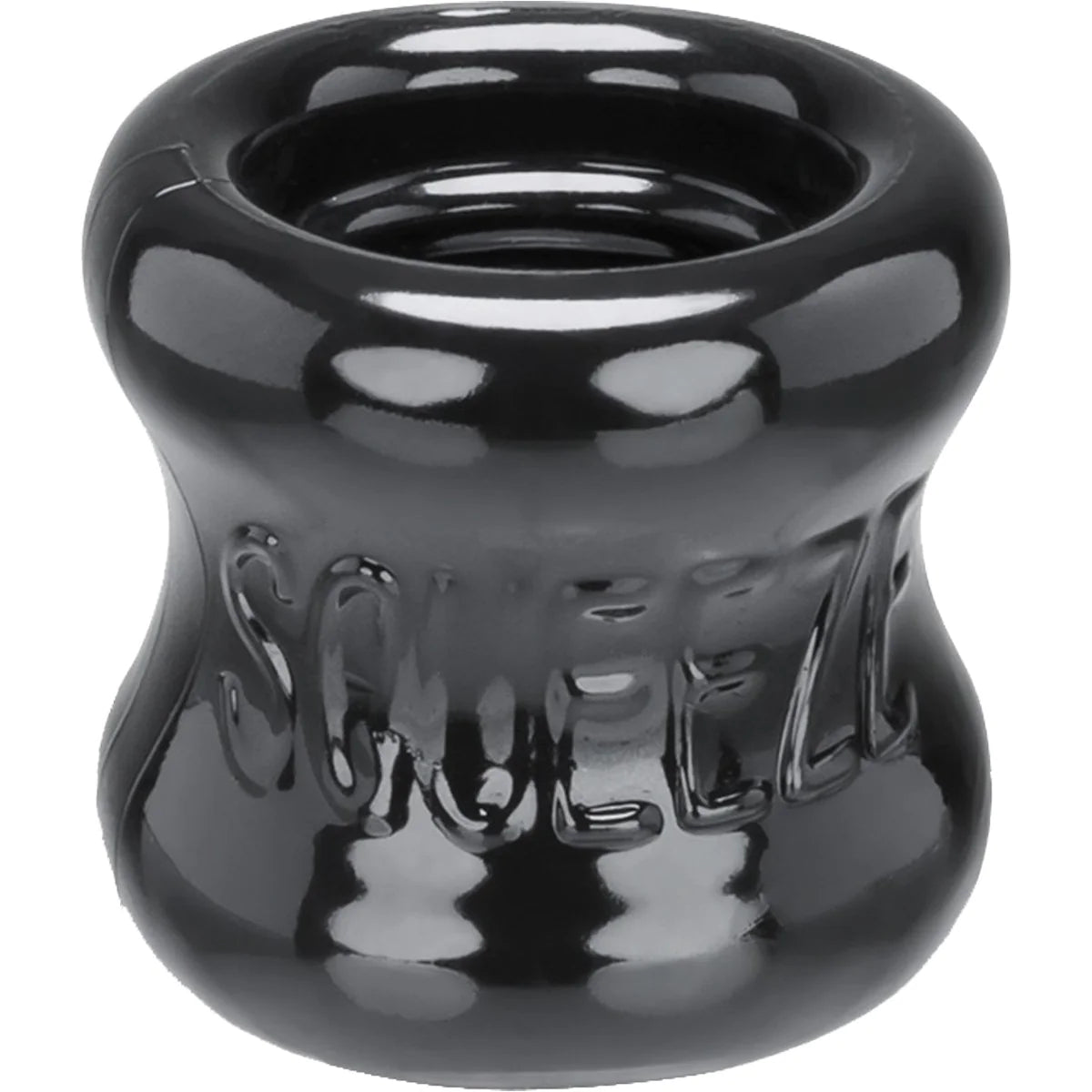 The Oxballs Squeeze, a hollow cylindrical toy made of black rubber. The word squeeze is subtly engraved on the outside of the toy, and some slight texture can be seen on the inside of the toy.