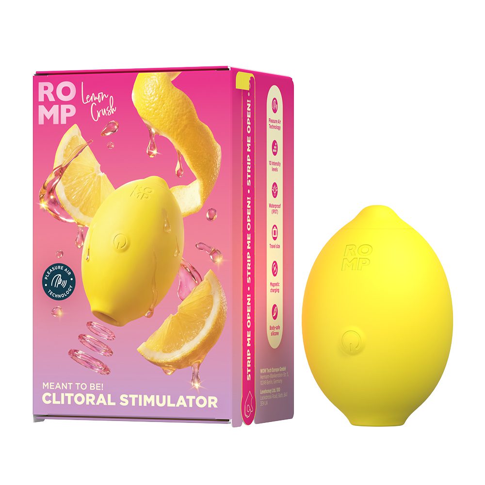 ROMP lemon crush toy pictured next to it's packagine, a bright pink and yellow box. On the box is the toy, a real lemon, and the words "ROMP Lemon Crush, meant to be, clitoral stimulator"