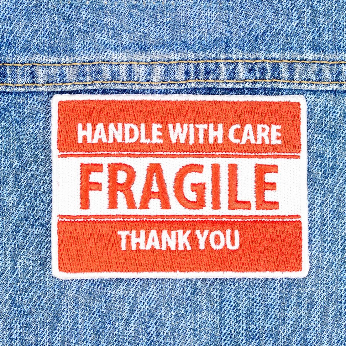 The Fragile Patch pictured against a denim background 