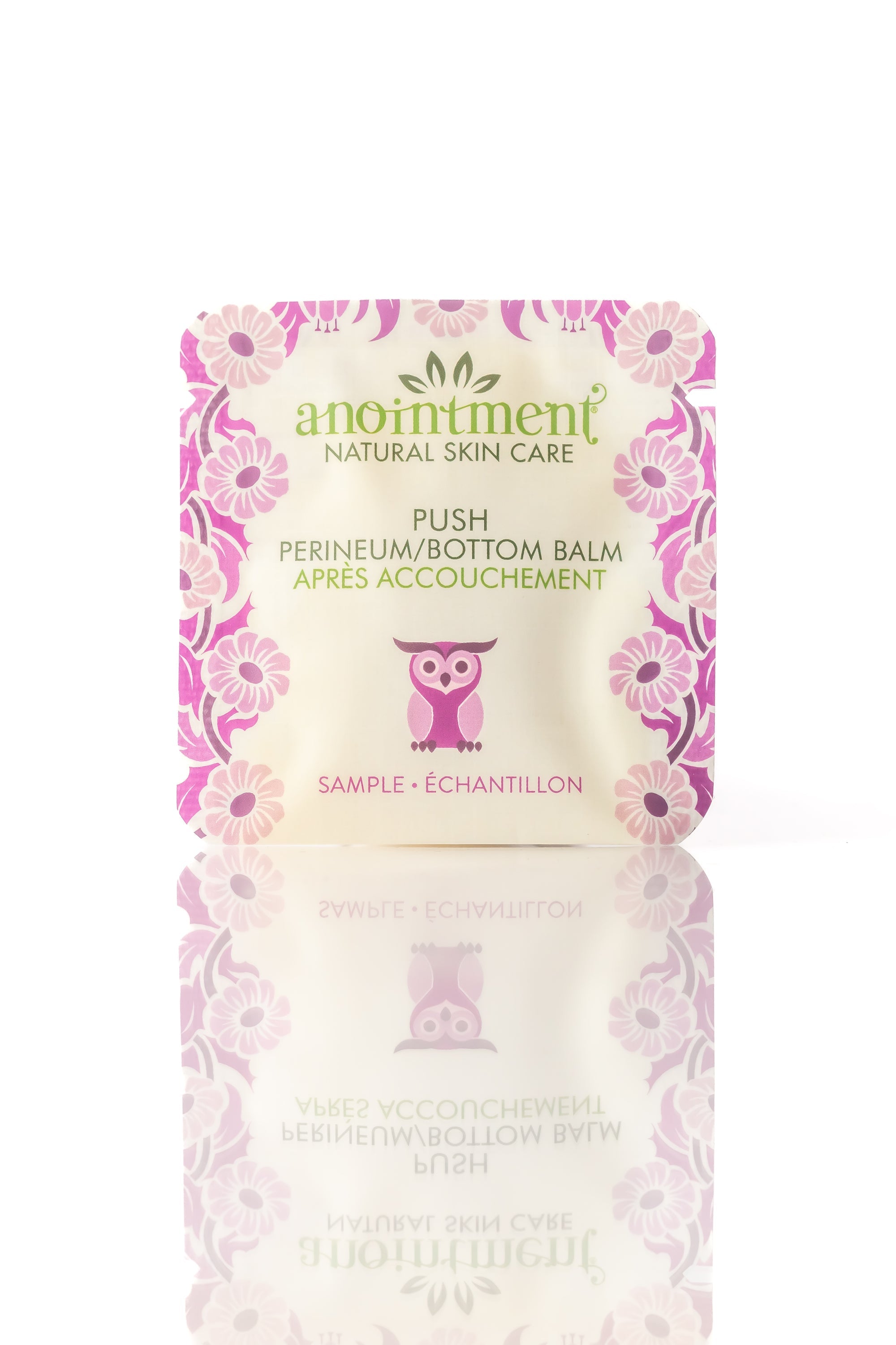 Sample package of anointment Perineum/Bottom Balm with floral design on a white background