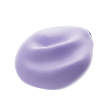 Purple asymmetrical grinding toy with ridged surface made of soft silicone on a white background. 