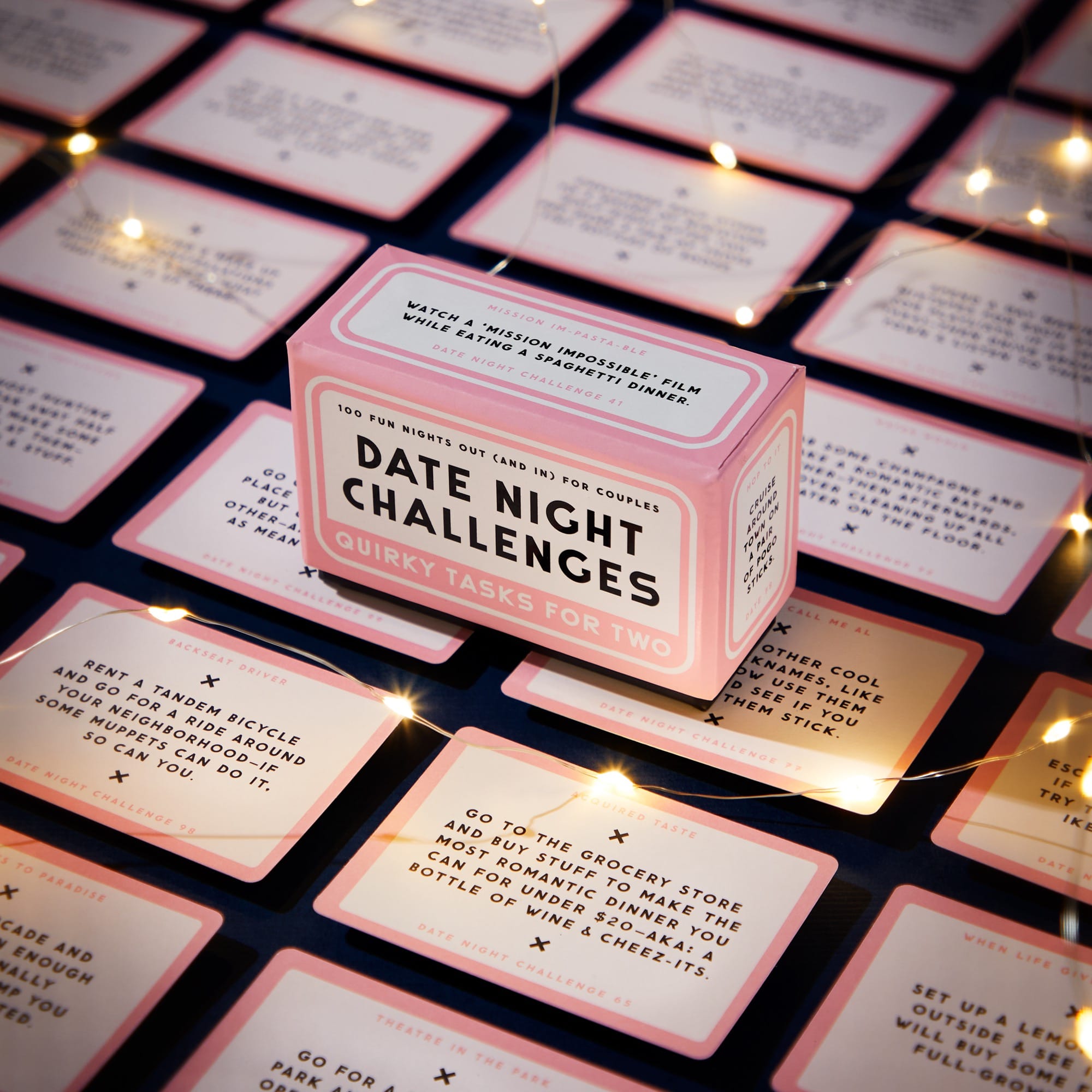 Date Night Challenges box surrounded by challenge cards and string lights