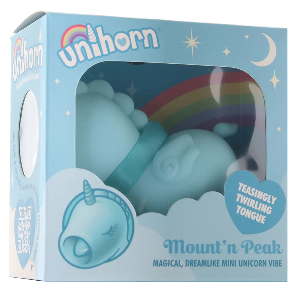 The packaging of the toy, which says Unihorn with a rainbow design, twinkly stars and a moon. 