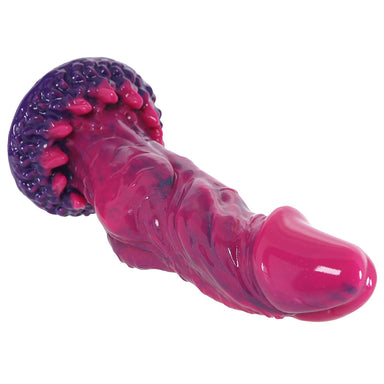 Pink and purple textured dildo on a white background