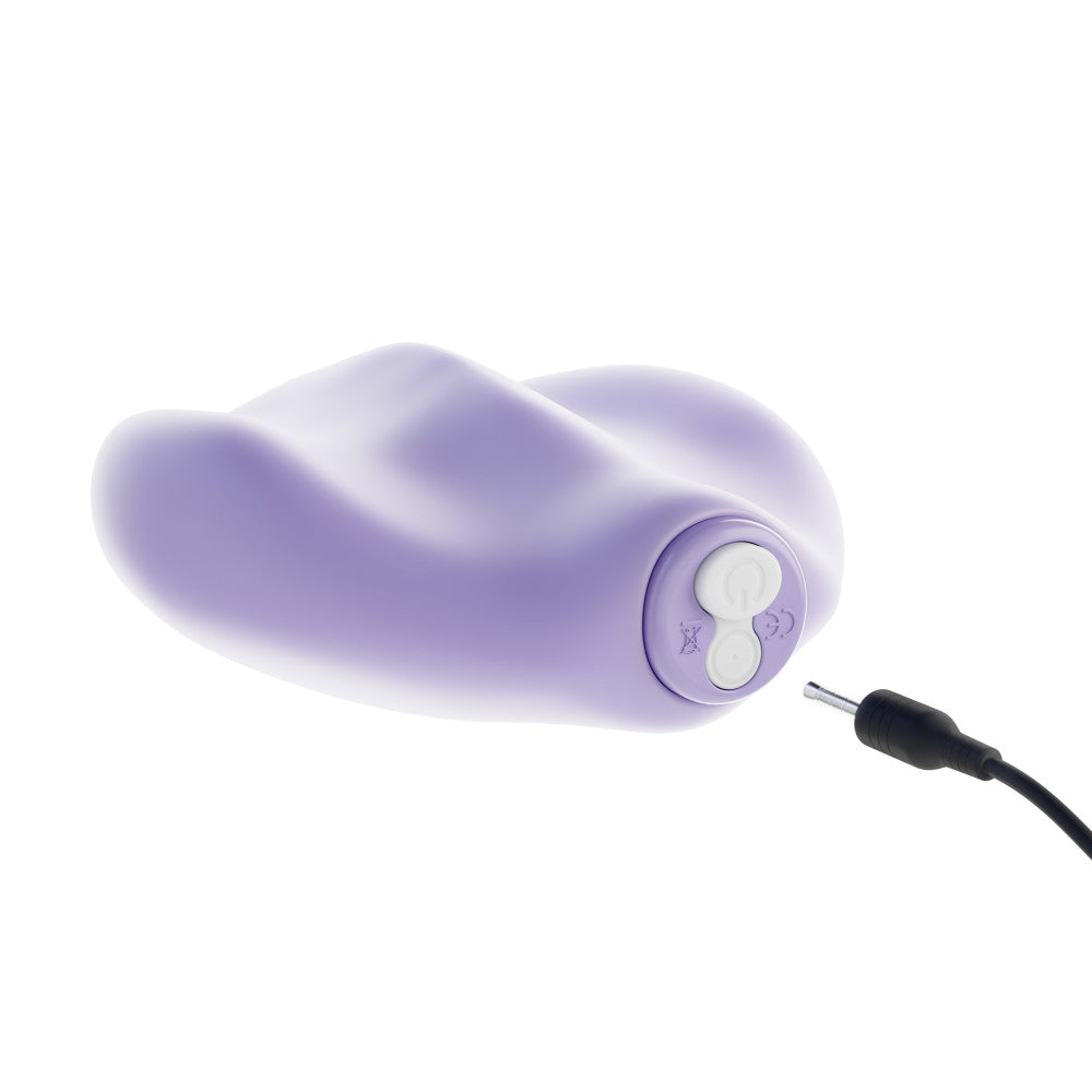 Pulsepad vibrating toy showing prong charger charging port. 