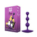 Romp amp pictured next to it's packaging, a purple box 