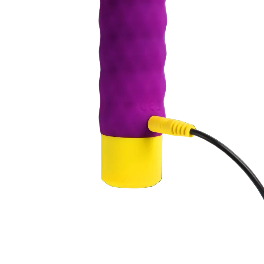 Romp beat toy plugged into its pin charger 