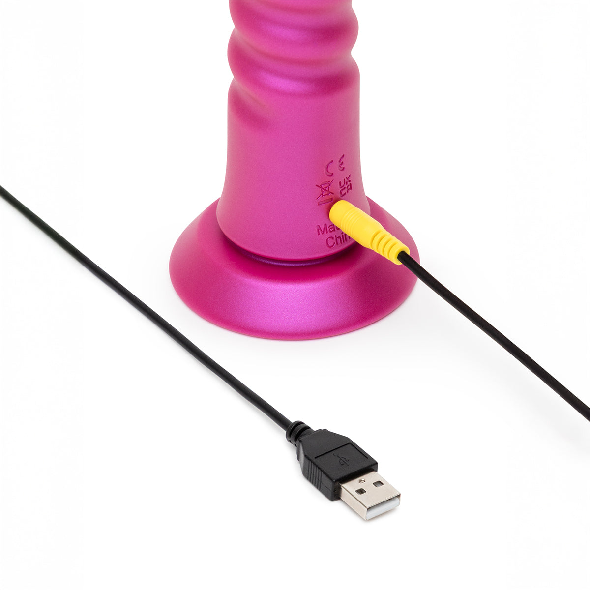 Romp jiggle plugged into its USB-A pin charger. 