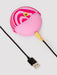 ROMP Spin with its charger plugged in to the base of the toy