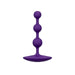 Purple silicone butt plug with 3 graduated beads on a white background