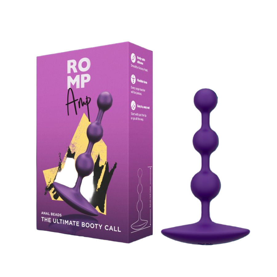 Romp amp pictured next to it's packaging, a purple box 