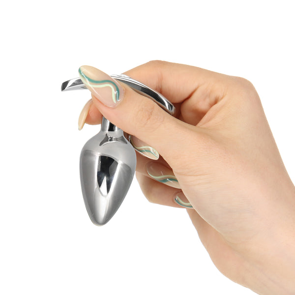 Hand holding Sneaky plug on a white background 