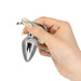 Hand holding Sneaky plug on a white background 