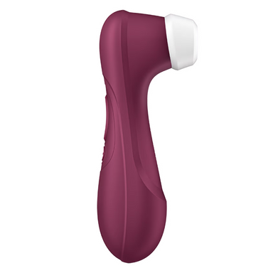 Side view of a purple suction-style sex toy. The toy has a long handle and it's head extends an inch off the handle.