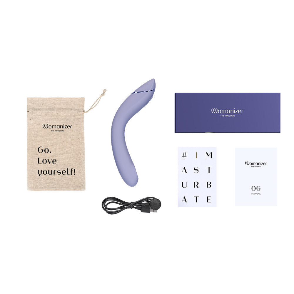 Contents of Womanizer OG packaging. Includes storage pouch, charger chord, and manual