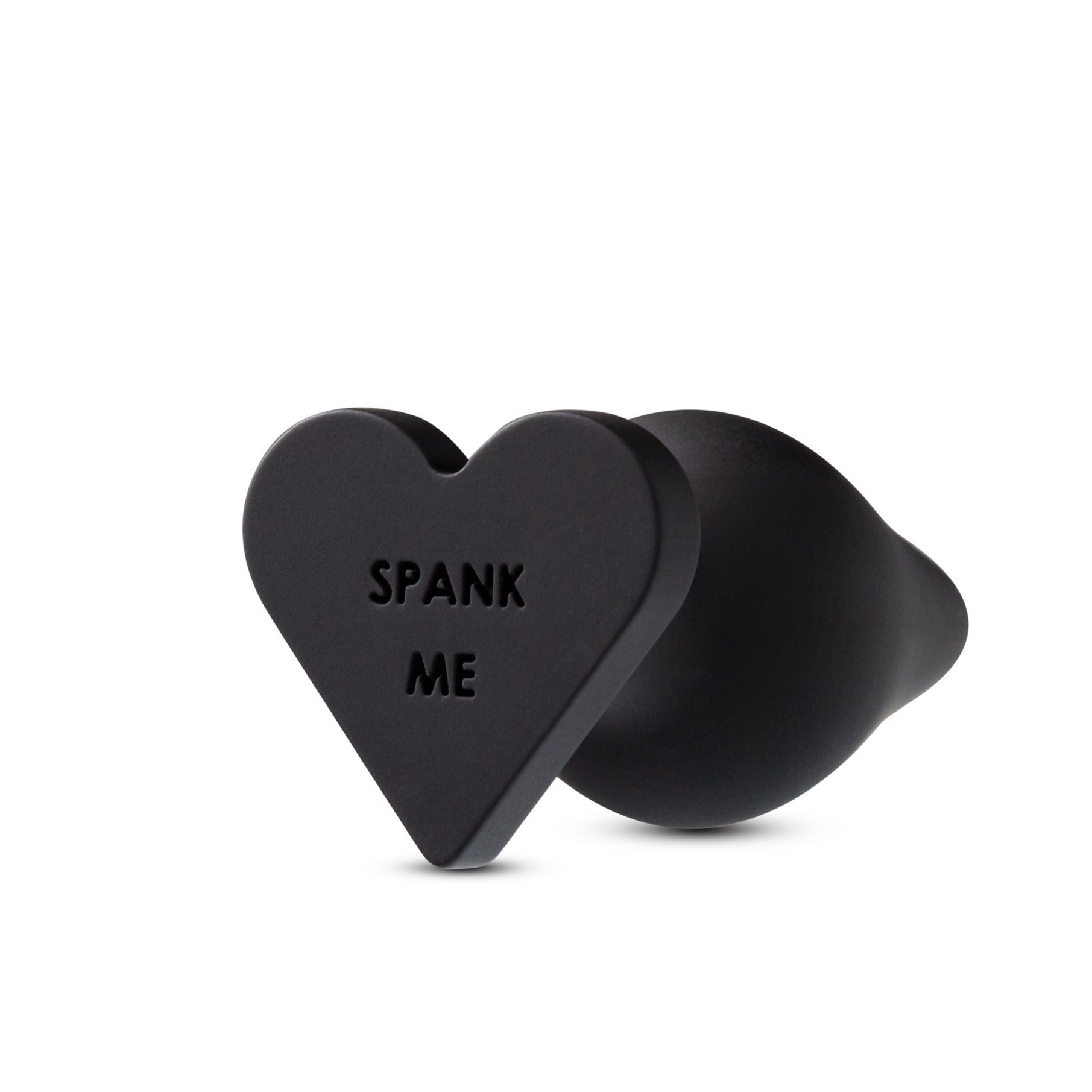 Heart shaped base that reads "Spank Me"