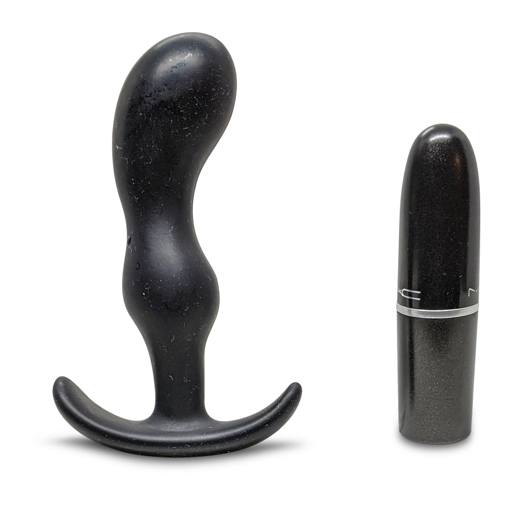 Medium butt plug with lipstick for scale
