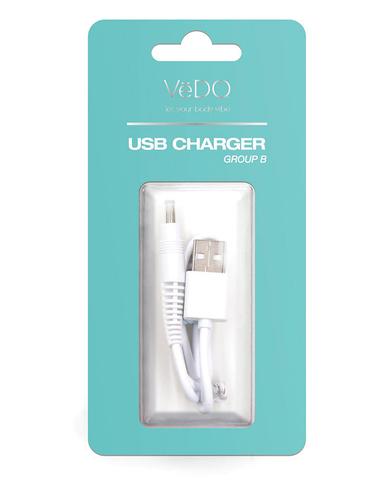white usb charger in packaging