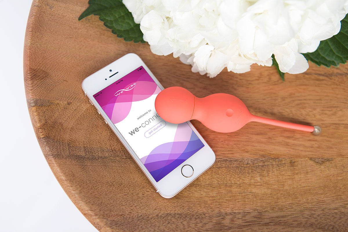We-Vibe Bloom on table with We-Connect app