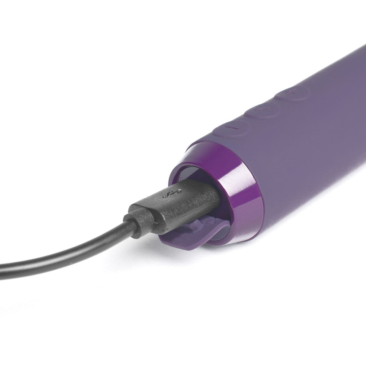 Purple g-spot bullet shown with charger connected