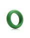Green cock ring on white background