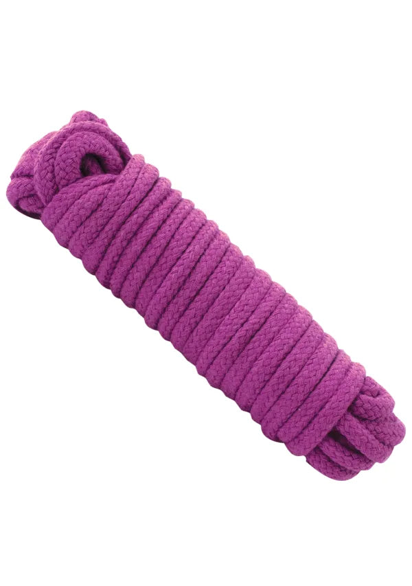 Purple cotton rope on white background